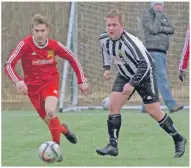  ?? Photo: Iain Ferguson, the Write Image. ?? South Lochaber Thistle captain, Martin Munro is pursued by Helensburg­h’s Jack Gorman.