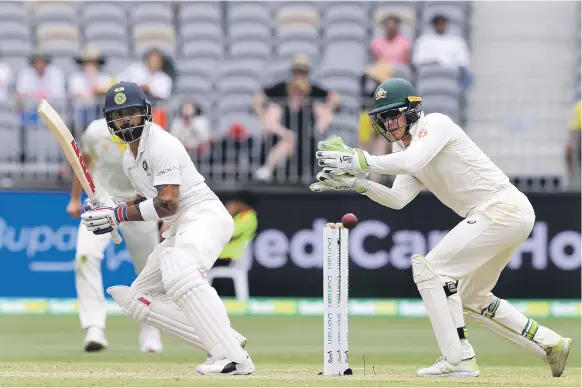  ?? Reuters ?? Virat Kohli played a chanceless innings during his unbeaten knock of 82 on Day 2 of the second Test and remains the prized wicket for Australia