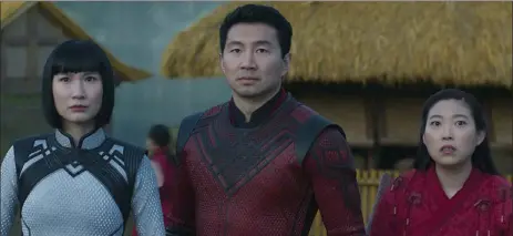  ?? Disney-marVel studios ?? this image released by marvel studios shows meng'er Zhang, simu liu and awkwafina in a scene from ‘shang-chi and the legend of the ten rings.’