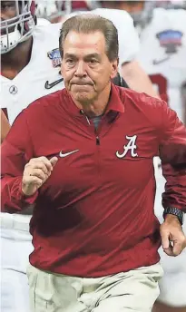  ??  ?? The CFP National Championsh­ip game pits the student, Georgia coach Kirby Smart, left, against his teacher, Alabama coach Nick Saban. LEFT: DALE ZANINE/USA TODAY SPORTS; RIGHT: CHUCK COOK/USA TODAY SPORTS