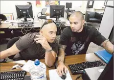  ?? Gary Friedman
Los Angeles Times ?? VETERANS Bryce Torres, left, and his brother Gladwin at Pasadena City College. Military Times ranked the campus eighth nationally among community colleges for its veterans services.
