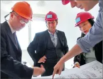  ?? PROVIDED TO CHINA DAILY ?? Director General of the Italian Ministry for the Environmen­t, Land and Sea Francesco La Camera (center) visits one of the ongoing projects in May 2017. Over the past 15 years, a series of Sino-Italian environmen­tal protection programs have been...