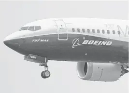  ?? ELAINE THOMPSON/AP ?? Boeing says the pandemic will reduce demand for new planes for the next decade, long after experts expect a vaccine for COVID-19. The company updated its forecast of the airplane market on Tuesday.