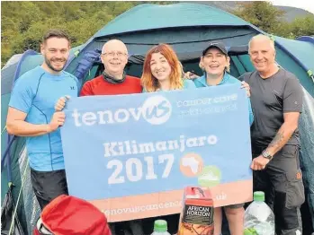  ??  ?? Jeff Fish (second from left) will climb Kilimanjar­o with Mike Bulpitt, Laura Jardine, Karen Parry-Jones and Carl Coombes for Tenovus Cancer Care