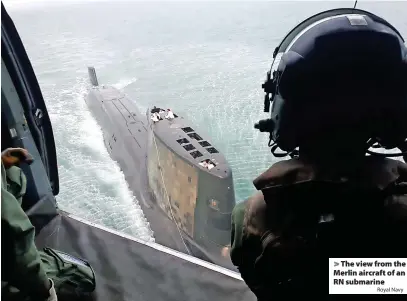  ?? Royal Navy ?? > The view from the Merlin aircraft of an RN submarine