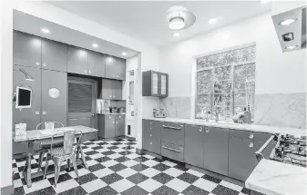  ??  ?? The Hollywood Hills home of film producer Stuart Cornfeld and his wife, Johanna Went, is for sale at $2.65 million. The kitchen has been updated while retaining its Art Deco style.