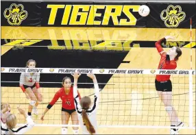  ?? MARK HUMPHREY ENTERPRISE-LEADER ?? Farmington senior Morgan Brye smashes a kill across the net. The Lady Cardinals swept Prairie Grove, 25-17, 25-23, 25-23. Brye had 13 kills with 14 digs.