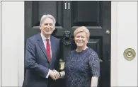  ?? PICTURE: AP PHOTO/FRANK AUGSTEIN. ?? TAX: Chancellor Philip Hammond with Norwegian Finance Minister Siv Jensen at 11 Downing Street in London.