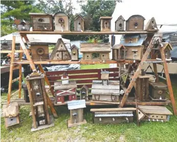  ?? FACEBOOK. COM PHOTOS ?? A display of handmade birdhouses at a stop in Crossville, Tenn., at a previous yard sale.