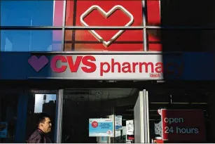  ?? JEENAH MOON / THE NEW YORK TIMES ?? CVS, America’s eighth-largest company, has been criticized for providing three-month supplies for some drugs, increasing the possibilit­ies for overdosing. One pharmacist wrote in an anonymous letter to a state board, “I am a danger to the public working for CVS.”