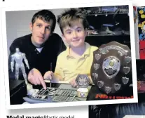  ??  ?? Medal magic Plastic model maker Cameron Stewart, right, and above with dad Graeme