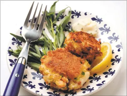  ?? STAFF FILE PHOTO ?? For prize-worthy, golden-brown crab cakes, use fresh Dungeness crabmeat and be creative with the herbs and spices.