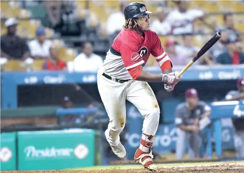  ?? FE ?? Vladimir Guerrero espera recibir el permiso de Toronto para jugar este año con los Leones del Escogido.