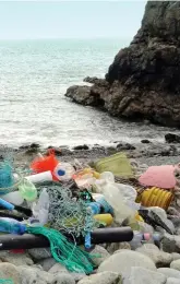  ??  ?? nets litter Ramsey beach in Scotland