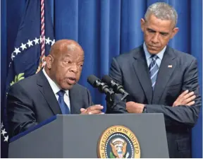  ?? CAROLYN KASTER, AP ?? President Obama listens as Rep. John Lewis, D- Ga., speaks at the Eisenhower Executive Office Building in Washington on Thursday.