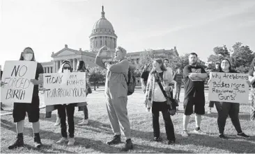  ?? SUE OGROCKI/AP ?? Abortion-rights supporters rally last week at the Oklahoma State Capitol in Oklahoma City.