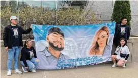  ?? Pat Tomlinson/Hearst Connecticu­t Media ?? Family members of Yuliana Arias Lozano, one of two people killed in a hit-and-run crash in Stamford in December, hold a banner in front of state Superior Court in Stamford on Tuesday.