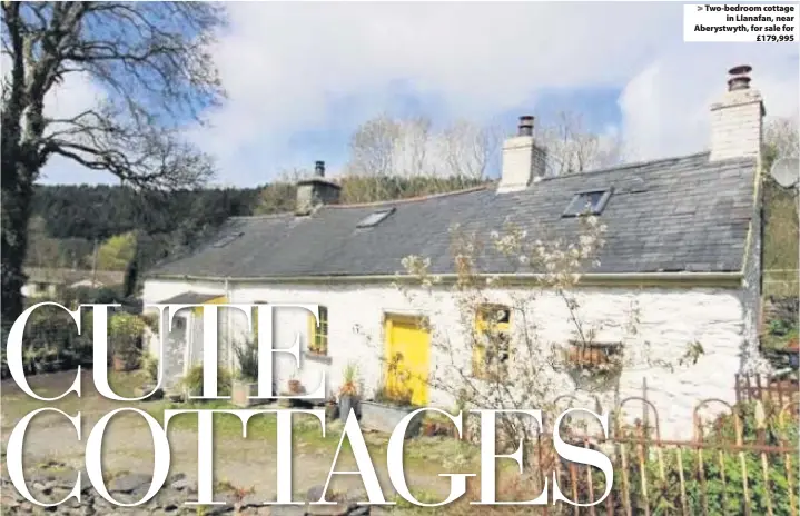  ??  ?? &gt; Two-bedroom cottage in Llanafan, near Aberystwyt­h, for sale for £179,995