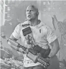  ?? WARNER BROS. ?? Oh, look, Dwayne Johnson is saving the world again. This time, it’s in “Rampage.”