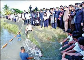  ?? AKP ?? Hun Sen called on Cambodians who returned from Thailand to take part in the agricultur­al sector as the government spends $5 million to expand fish and frog breeding jobs.