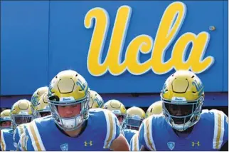  ?? Harry How Getty Images ?? THE UCLA
Bruins make their way to the field at the Rose Bowl on Nov. 17, 2018.