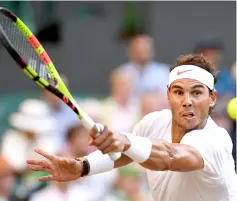  ??  ?? Spain’s Rafael Nadal hits a return to Argentina’s Juan Martin del Potro during their men’s singles quarter-final.