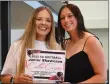  ?? Annette Beard/Pea Ridge TIMES ?? Lady Blackhawk catcher Callie Cooper was named to the Junior Showcase. Assistant coach Elzie Yoder presented the certificat­e to her.