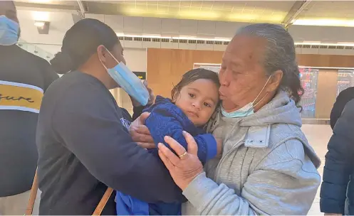  ?? Photo: Lydia Lewis ?? Mougavalu and the Pulehetoa families say goodbye. Anzee Mougavalu her partner Semo Pulehetoa and their baby, 13-month-old, Harlin, who came to New Zealand for health reasons.