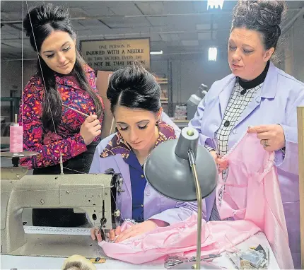  ??  ?? Sisters Tamara, left, and Angelea with mum Emma on the production line