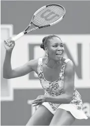  ?? Matthew Stockman / Getty Images ?? Venus Williams pounds out a victory over Anastasija Sevastova to advance to the quarterfin­als about 18 hours after beating sister Serena.