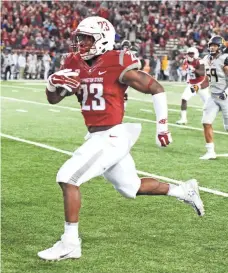  ?? JAMES SNOOK, USA TODAY SPORTS ?? Running back Gerard Wicks averages 5.7 yards per carry this season and leads Washington State with 11 rushing TDs.