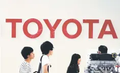  ??  ?? The logo of Japan’s Toyota Motors is displayed at their showroom in Tokyo on August 3. Japanese car giant Toyota said its first quarter net profit rose 7.2 per cent, but left its fullyear forecast unchanged amid concerns over trade frictions. — AFP photo