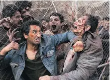  ??  ?? Cliff Curtis and zombies from Season 3 of Fear the Walking Dead.