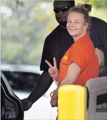  ?? MICHAEL HOLAHAN THE ASSOCIATED PRESS ?? Reality Winner, who pleaded guilty to mailing a classified U.S. report to a news organizati­on, walks out of a courthouse in Augusta, Ga., Thursday.