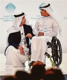  ?? Virendra Saklani/Gulf News ?? Lt Gen Shaikh Saif Bin Zayed Al Nahyan with Esmail Mohammad Abdullah, a former member of the UAE Armed Forces now working in the Ministry of Foreign Affairs during a session titled ‘Nation’s sustainabi­lity’ at the World Government Summit yesterday.