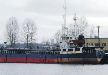  ??  ?? The MV Sun Sea was used to smuggle nearly 500 Sri Lankan Tamil migrants to the West Coast in 2010. Since then it has languished at a dock in suburban Vancouver, awaiting its final destiny.