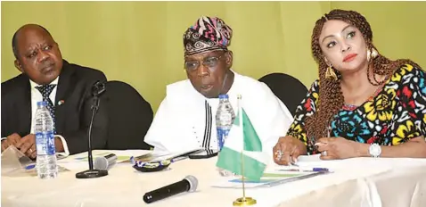  ?? PHOTO: NAN ?? President of Angola- Nigeria Business Council ( ANBC), Fifi Ejindu ( left); former President, Olusegun Obasanjo; and Angolan Ambassador to Nigeria, Dr Jose Bamoquina Zau, during a news conference on Angola- Nigeria Diplomatic Business Forum in Lagos… at the weekend.