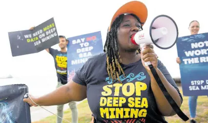  ?? FILE ?? File photo shows Dahvia Hylton leading climate advocates in a protest against deep sea mining (DSM) at the Kingston Waterfront adjacent to the Jamaica Conference Centre on Thursday, July 20,2023. On Monday, delegates from various nations will convene in Kingston to discuss the rules and regulation­s pertaining to DSM during the 29th session of the Internatio­nal Seabed Authority council.