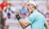  ?? MINAS PANAGIOTAK­IS/GETTY IMAGES ?? Denis Shapovalov wins a point against Dominic Thiem at the Rogers Cup tennis tournament in Montreal on Wednesday. Thiem beat the 20-year-old from Ontario, 6-4, 3-6, 6-3.