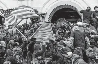  ?? Lev Radin / Pacific Press ?? Insurrecti­onists clash with police at the Capitol on Jan. 6. Democrats have failed to respond to an assault on voting, placing their party, and this nation, in great peril.