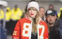  ?? ED ZURGA/ASSOCIATED PRESS ?? Taylor Swift arrives before an NFL wild-card playoff football game between the Kansas Chiefs and the Miami Dolphins on Jan. 13 in Kansas City, Mo. A scourge of pornograph­ic deepfake images generated by artificial intelligen­ce and sexualizin­g people without their consent has hit its most famous victim, singer Taylor Swift, drawing attention to a problem that tech platforms and anti-abuse groups have struggled to solve.