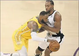  ?? Robyn Beck AFP via Getty Images ?? LeBRON JAMES and the Lakers could run into problems much bigger than Kawhi Leonard and the Clippers if the NBA’s bubble in Orlando doesn’t work.