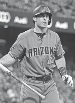  ?? ERIC RISBERG/AP ?? The Diamondbac­ks’ Paul Goldschmid­t reacts after striking out vs. Giants starter Madison Bumgarner Tuesday in San Francisco.