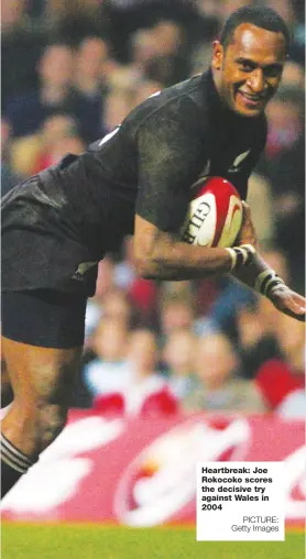  ?? PICTURE: Getty Images ?? Heartbreak: Joe Rokocoko scores the decisive try against Wales in 2004