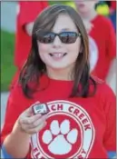  ??  ?? French Creek Elementary School student, Sarah Torrens is ready with her pedometer at the school’s walkathon.