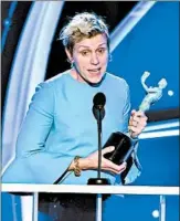  ?? VINCE BUCCI/INVISION ?? Frances McDormand accepts a SAG Award for her role in “Three Billboards Outside Ebbing, Missouri.”