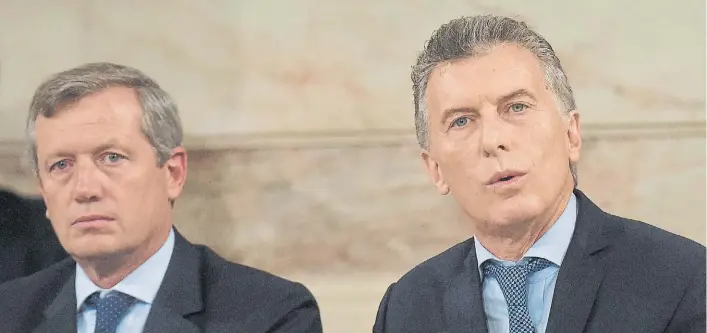  ?? AP ?? Socios políticos. Mauricio Macri y el presidente de la Cámara de Diputados, Emilio Monzó, el 1 de marzo, durante la inauguraci­ón de las sesiones ordinarias en el Congreso.