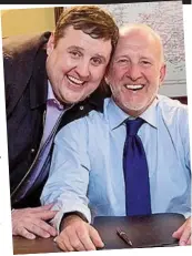  ??  ?? Bolton’s best: Peter Kay (with Jonathan) starred in a 2017 Pride And Prejudice spoof ad for his hometown bakery