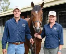  ??  ?? BIG SALE: Cameron and Kellie Bond with by Gonski out Blazing Sky, who topped the Magic Millions sale in 2010. of
