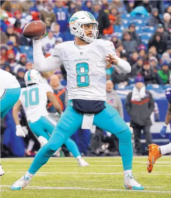  ?? AP FILE ?? Miami quarterbac­k Matt Moore will make his first career playoff start Sunday when the Dolphins visit the Pittsburgh Steelers. Moore is filling in for the injured Ryan Tannehill.